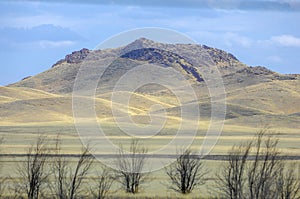 Autumn landscape, steppe with mountains. prairie, veld, veldt. a