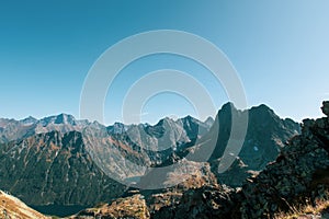 Autumn landscape of Tatra Mountains: Rysy, Mieguszowiecki Peak, Niznie Rysy, Czarny Staw pod Rysami Lake.