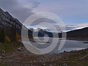 Autumn landscape with view of Medicine Lake in Jasper National Park, Alberta, Canada in the Rocky Mountains.