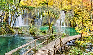 Autumn landscape with waterfall in Plitvice