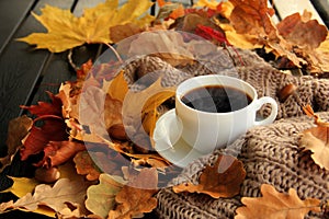 Autumn leaves and coffee cup