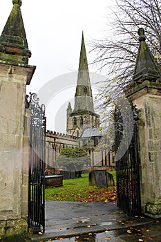 Autumn leaves falling at St. Oswald Church in England