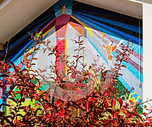 Autumn leaves and mosaic in Medjugorje