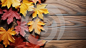 Autumn Leaves over wooden background.With copy space