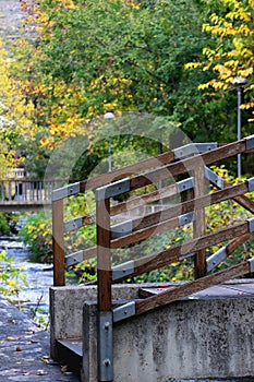 Autumn Leaves and Rustic Bridge