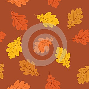 Autumn leaves seamless pattern. Fall nature oak leaf over brown background