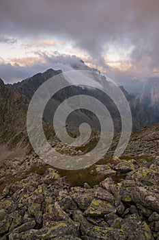 Low clouds touching mountain top