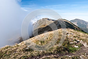 Autumn Mala Fatra mountains with hills and blue sky with clouds