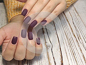 Autumn manicure. Beautyful nails design with autumn leaves