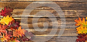 Autumn maple leaves on wooden table