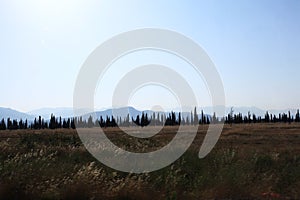 autumn meadows with mountains at horizon