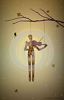 Autumn melancholy, last autumn melody, marionette hanging on the tree branch and playing violine for tit birds,