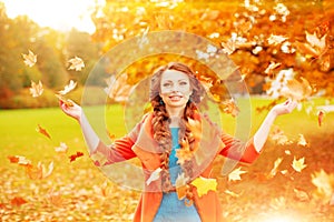 Autumn model, bright make up. woman on background fall landscape