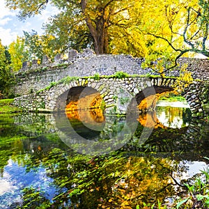 Autumn mood - ancient bridge in Ninfa park