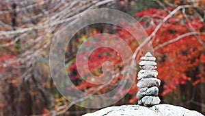 Autumn mood - red leaves, fallen leaves, and stone pagodas