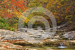 Autumn mountain cascade