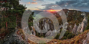 Autumn mountain at sunset with rocks