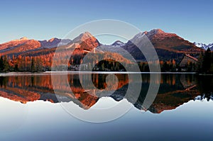 Autumn mountains with reflection in the lake