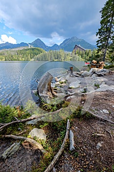 Autumn nature reflection in lake of Strbske Pleso in Slovakia