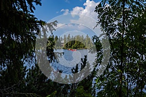 Autumn nature reflection in lake of Strbske Pleso in Slovakia