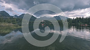 Autumn nature reflection in lake of Strbske Pleso in Slovakia -