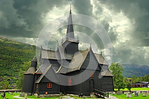 Autumn Norway landscape with stavkirke