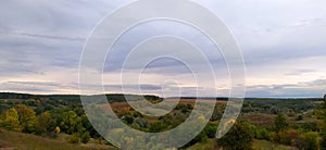 autumn panorama of hilly area. The village of Semigory, Boguslavsky district, Kyiv region, Ukraine.