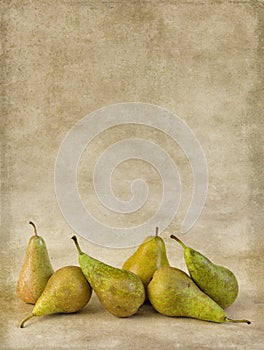 Autumn pears on grunge wallpaper