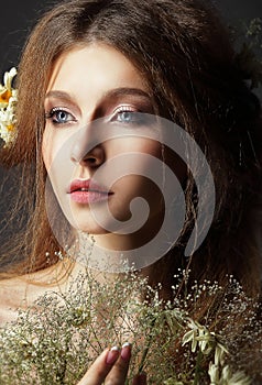 Autumn. Pensive Romantic Brunette with Leafy Withered Herbarium photo