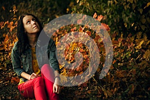 Autumn photography of a beautiful girl in the forest