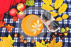 Autumn picnic with homemade pumpkin pie and coffee. Autumn mood, top view, flat lay