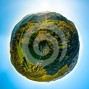 Autumn planet. Sunlit valleys, mountains and a variety of autumn colors. Alsace, France