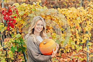 Autumn portrait of beautiful woman with blond hair