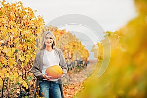 Autumn portrait of beautiful woman with blond hair