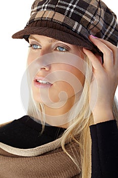 Autumn portrait of blonde beauty in hat