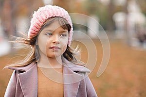 Autumn portrait of child girl outdoor wear hat