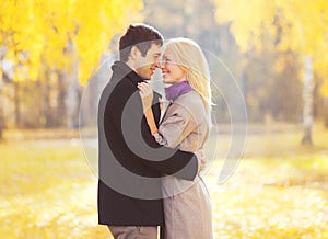 Autumn portrait of happy loving young couple in love