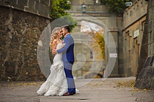 Autumn portrait of happy wedding couple.