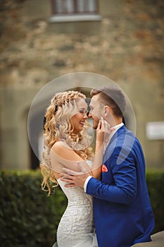 Autumn portrait of happy wedding couple.