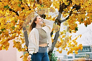 Autumn portrait of young pretty girl