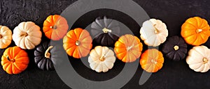 Autumn pumpkin banner Halloween colors against a black stone background