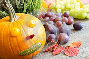 Autumn pumpkin fun background with colorful leaves and fruits and vegetables