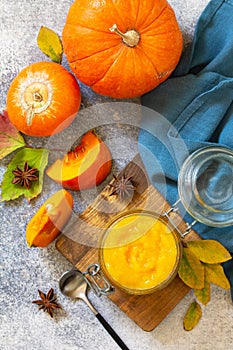 Autumn pumpkin meals for thanksgiving day. Pumpkin Puree on a slate background.