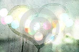 Autumn rain, draw heart on glass - love concept