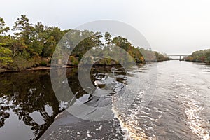 Autumn on the river on a foggy morning photo