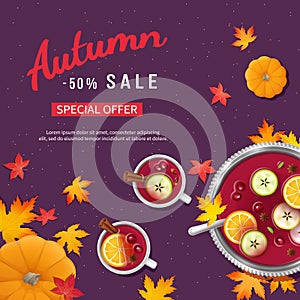 Autumn sale background with punch in a bowl and cups, slices of oranges, apples, spices, pumpkins, leaves on a table.