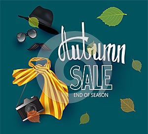 Autumn sale banner with accessoires and falling leaves.