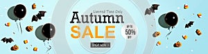 Autumn sale banner with balloons and Halloween decorations