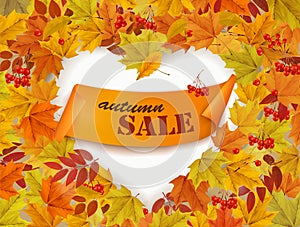 Autumn sale frame with colorful autumn leaves a heart shape.