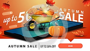 Autumn sale, modern discount web banner for your website with a smartphone, garden wheelbarrow with a harvest of pumpkins.